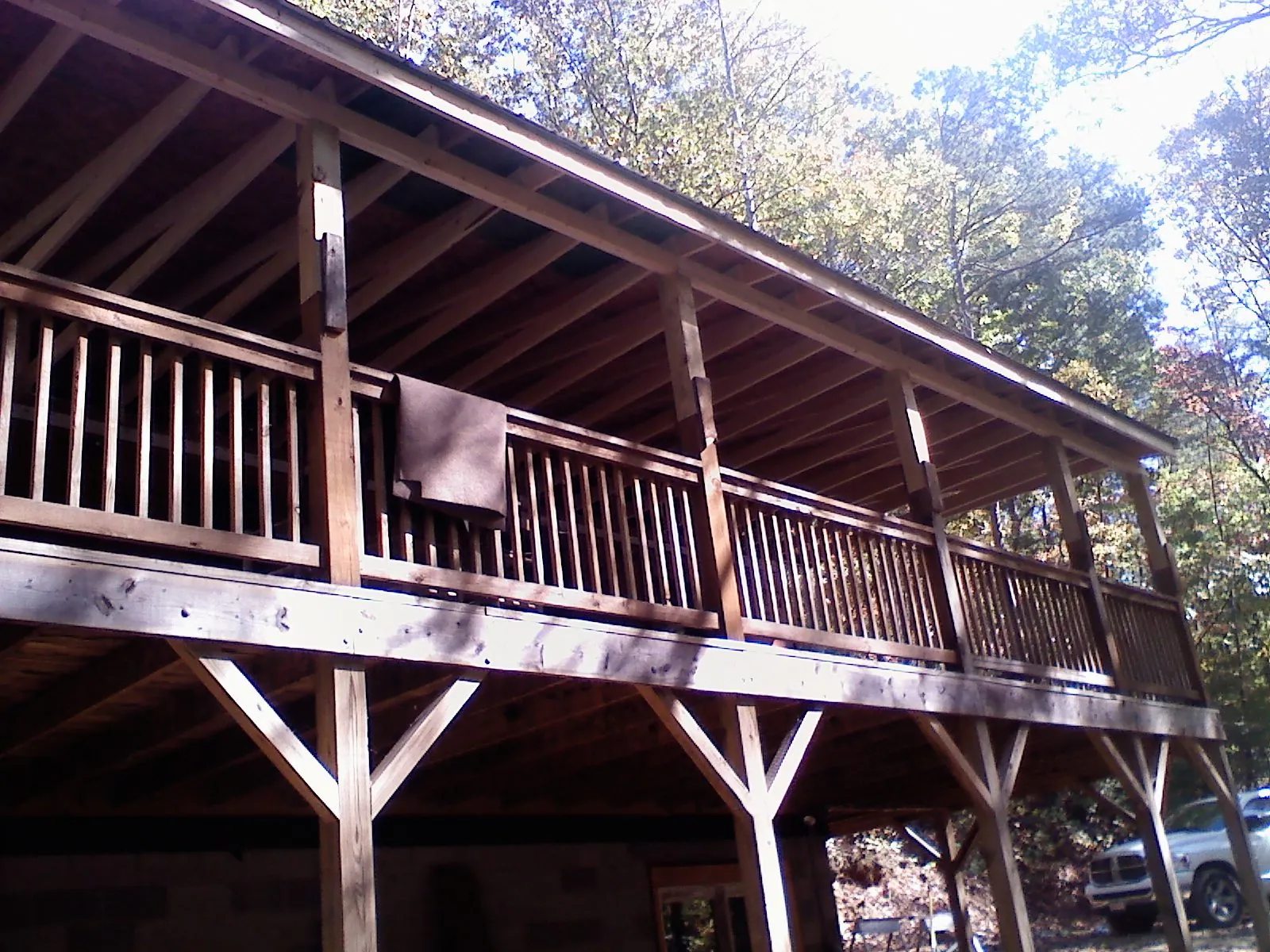 Timber framing under a new elevated porch and deck — Roof Leak Repair in Many by Roofing Brothers